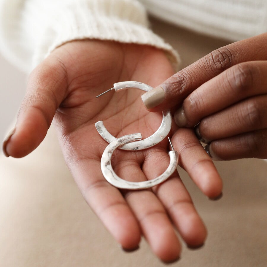 Sterling silver hammered hoop best sale earrings